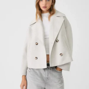 Veste chic courte à double boutonnage pour femme
